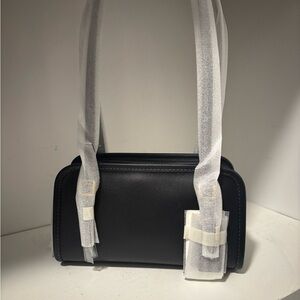 Sold Coach Swing Zip 20